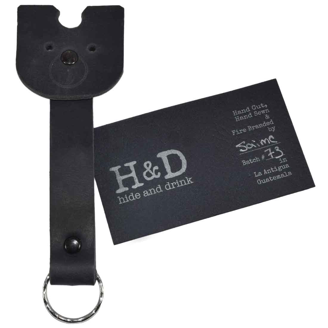 Doggy Fob by Hide & Drink featuring a black Full Grain Leather Critter Keychain, designed for practicality and style for dog lovers. Critter Keychain Dog Key Ring Pet Fob, Full Grain Leather, StockyardX, Small Batch Production, Hand Cut, Hand Sewn, Fire Branded, Artisan, Handmade in La Antigua Guatemala & Oaxaca Mexico.