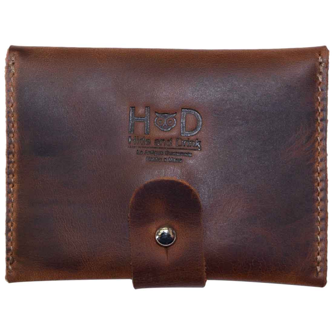Front view of the stylish Elephant Coin Pouch by Hide & Drink featuring a snap closure, made from full grain leather to ensure durability and elegance. Card Pouch Elephant/Coin & Folded Bills/Wallet/Cable Holder/USB/SD/Change, Full Grain Leather, StockyardX, Hand Cut, Hand Sewn, Fire Branded, Artisan, Handmade in La Antigua Guatemala & Oaxaca Mexico.