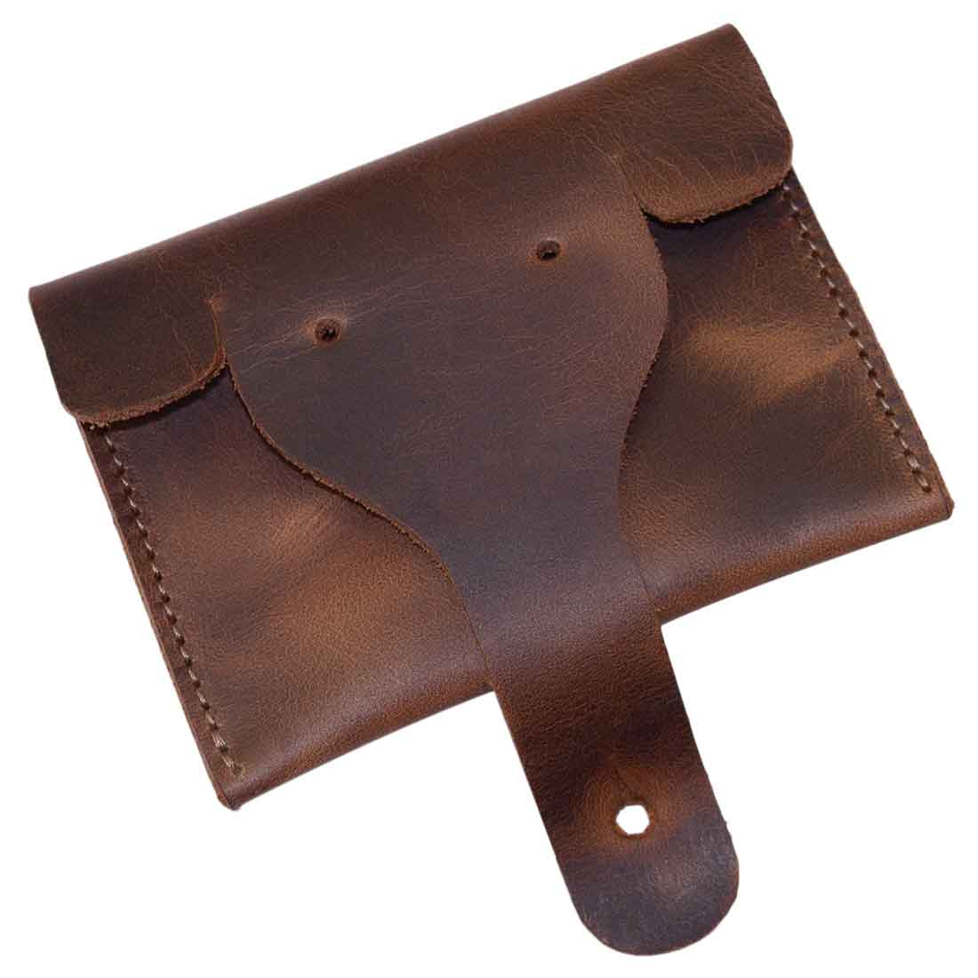 Premium Elephant Coin Pouch by Hide & Drink displayed at an angle, crafted from full grain leather for a rustic touch, ideal for carrying your coins and small valuables. Card Pouch Elephant/Coin & Folded Bills/Wallet/Cable Holder/USB/SD/Change, Full Grain Leather, StockyardX, Hand Cut, Hand Sewn, Fire Branded, Artisan, Handmade in La Antigua Guatemala & Oaxaca Mexico.