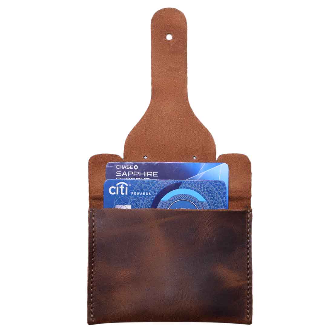Elephant Coin Pouch by Hide & Drink showcasing a credit card inside, made from durable full grain leather, this elegant pouch is perfect for tokens and essentials. Card Pouch Elephant/Coin & Folded Bills/Wallet/Cable Holder/USB/SD/Change, Full Grain Leather, StockyardX, Hand Cut, Hand Sewn, Fire Branded, Artisan, Handmade in La Antigua Guatemala & Oaxaca Mexico.
