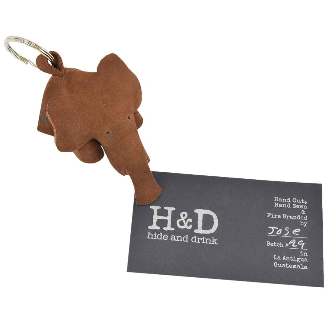 Charming Full Grain Leather Animal Key Chain by Hide & Drink featuring a delightful elephant shape. This handcrafted Critter Keychain acts as both a cute fob charm and an elegant animal key holder charm pendant, showcasing the artisan craftsmanship from La Antigua Guatemala.
