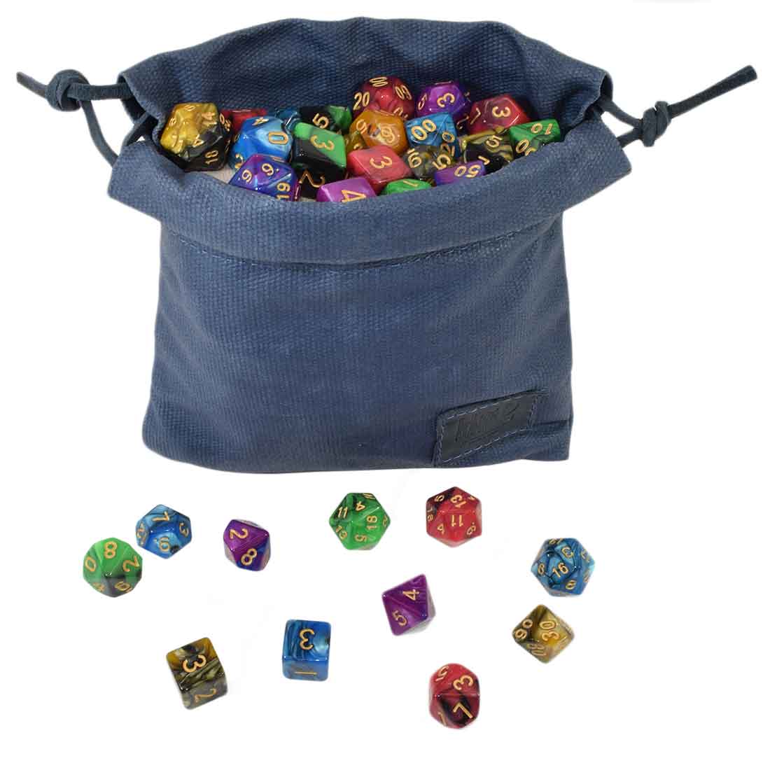 Hide & Drink Golf Pouch filled with colorful gaming dice, demonstrating its excellent capacity for organizing assorted items. This versatile waxed canvas pouch is perfect for your golf bag or play area. Waxed Canvas Golf Valuables Field Pouch, Golf Bag, Sport Organizer, Multipurpose Pouch with String, StockyardX, Small Batch Production, Hand Cut, Hand Sewn, Fire Branded, Artisan, Handmade in La Antigua Guatemala & Oaxaca Mexico.