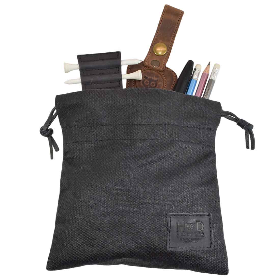 Hide & Drink Golf Pouch securely closed, showcasing its black durable waxed canvas design. Ideal for organizing golf valuables and other essentials. Waxed Canvas Golf Valuables Field Pouch, Golf Bag, Sport Organizer, Multipurpose Pouch with String, StockyardX, Small Batch Production, Hand Cut, Hand Sewn, Fire Branded, Artisan, Handmade in La Antigua Guatemala & Oaxaca Mexico.