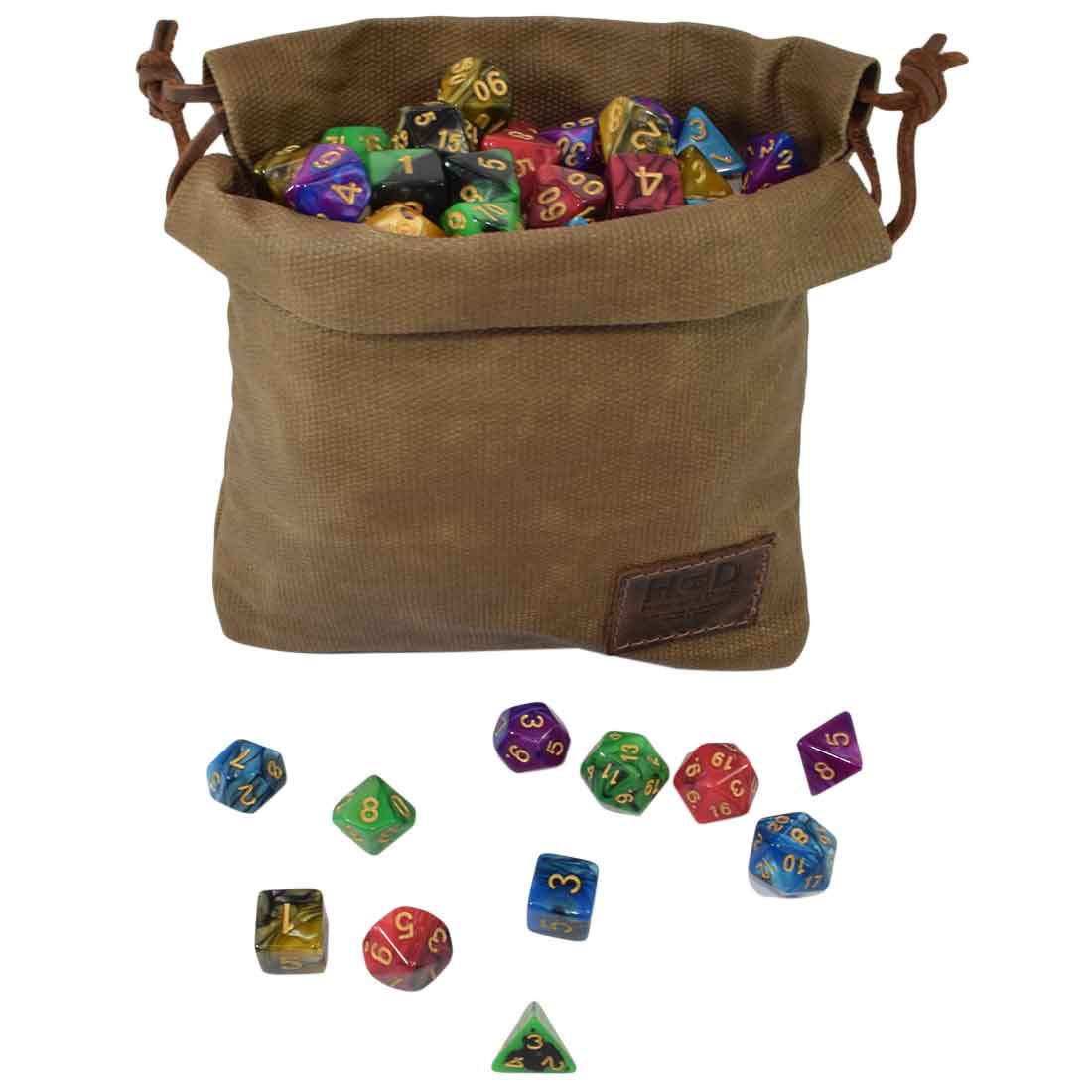 Hide & Drink Golf Pouch filled with vibrant dice, showcasing its versatility as an organizer for different types of valuables. Perfect for golf bags or other activities. Waxed Canvas Golf Valuables Field Pouch, Golf Bag, Sport Organizer, Multipurpose Pouch with String, StockyardX, Small Batch Production, Hand Cut, Hand Sewn, Fire Branded, Artisan, Handmade in La Antigua Guatemala & Oaxaca Mexico.