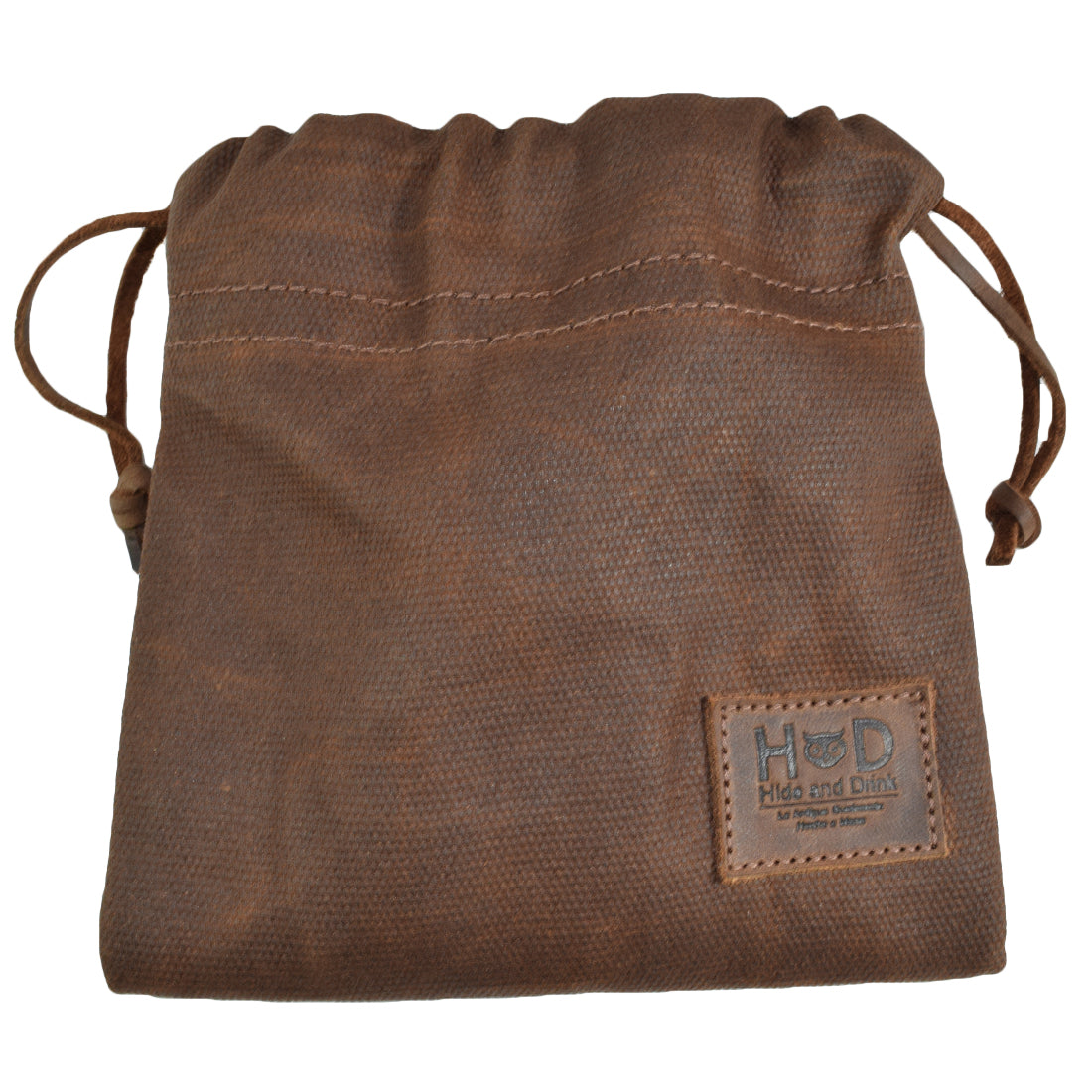 The Hide & Drink Golf Pouch, a handcrafted waxed canvas pouch, stylishly holds golf essentials. This durable and practical pouch is great for keeping smaller items organized in your golf bag. Waxed Canvas Golf Valuables Field Pouch, Golf Bag, Sport Organizer, Multipurpose Pouch with String, StockyardX, Small Batch Production, Hand Cut, Hand Sewn, Fire Branded, Artisan, Handmade in La Antigua Guatemala & Oaxaca Mexico.