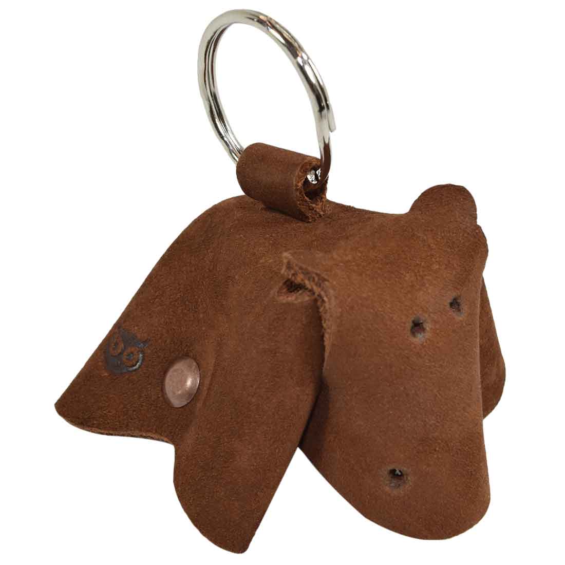 Stylish Full Grain Leather Animal Key Chain by Hide & Drink, featuring a cute cow design. This Critter Keychain is perfect as a fob charm and an elegant animal key holder charm pendant, showcasing artisan craftsmanship from La Antigua Guatemala.