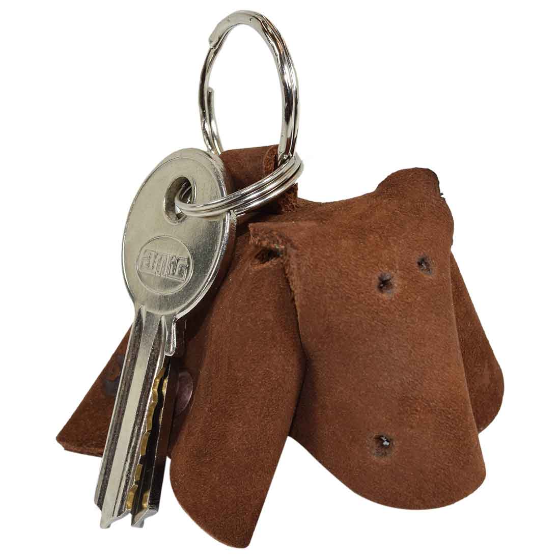 Artisan Full Grain Leather Animal Key Chain from Hide & Drink, designed with a lovely cow shape. This charming Critter Keychain serves as a fob charm and an animal key holder charm pendant, reflecting the small batch production in La Antigua Guatemala.