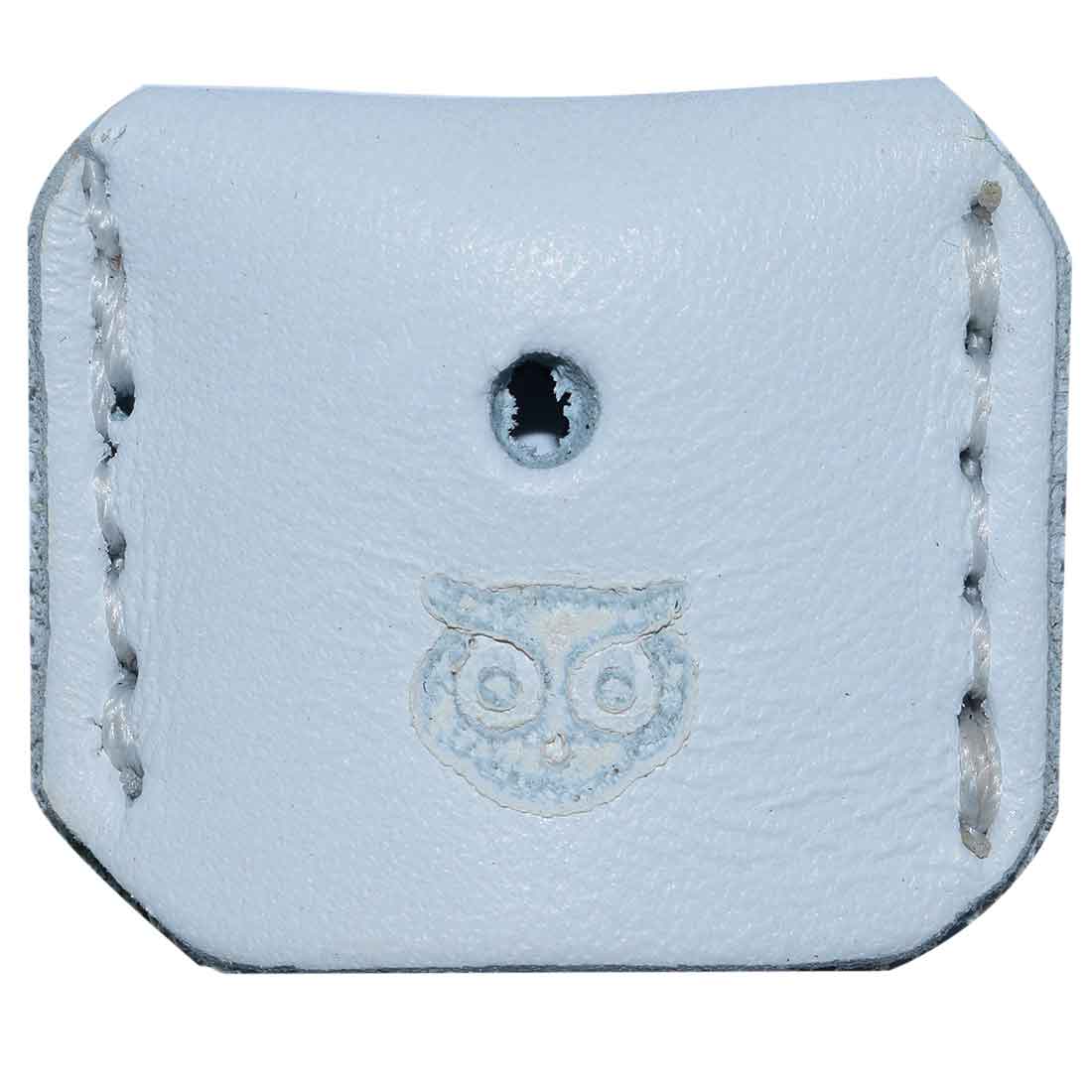 Close-up view of a white Key Cover by Hide & Drink, showcasing its artisan features. This key cover is made from high-quality full grain leather, part of a set of 5 key protectors that are hand cut, hand sewn, and fire branded. Each piece reflects careful small batch production, handmade in La Antigua Guatemala & Oaxaca Mexico.