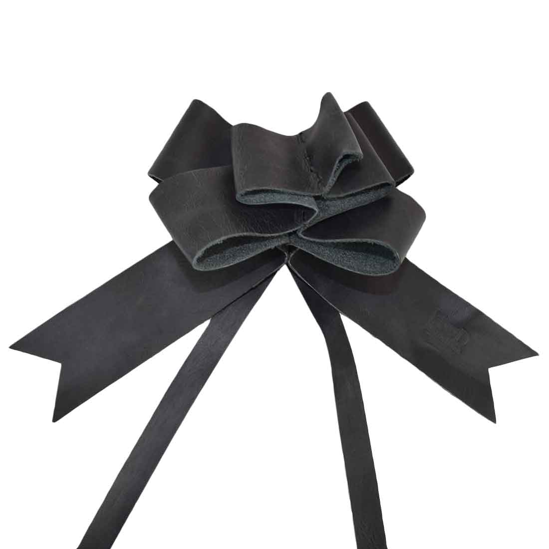 Stylish Black Ribbon Decor featuring a handcrafted Bow Wrap by Hide & Drink, made from quality Full Grain Leather. This elegant piece is perfect for holiday gifting, highlighting artisan craftsmanship with small batch production, hand cut, and hand sewn qualities made in La Antigua Guatemala and Oaxaca Mexico.