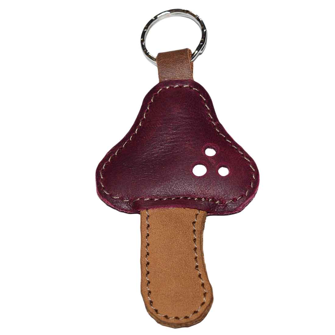 Mushroom Keychain by Hide & Drink features a vibrant red design and is made from sturdy Full Grain Leather. Known as a unique accessory for your keys, this Red Mushroom Keychain embodies StockyardX's commitment to small batch production. Hand cut, hand sewn, and fire branded, this artisan piece is handmade in La Antigua Guatemala & Oaxaca Mexico.