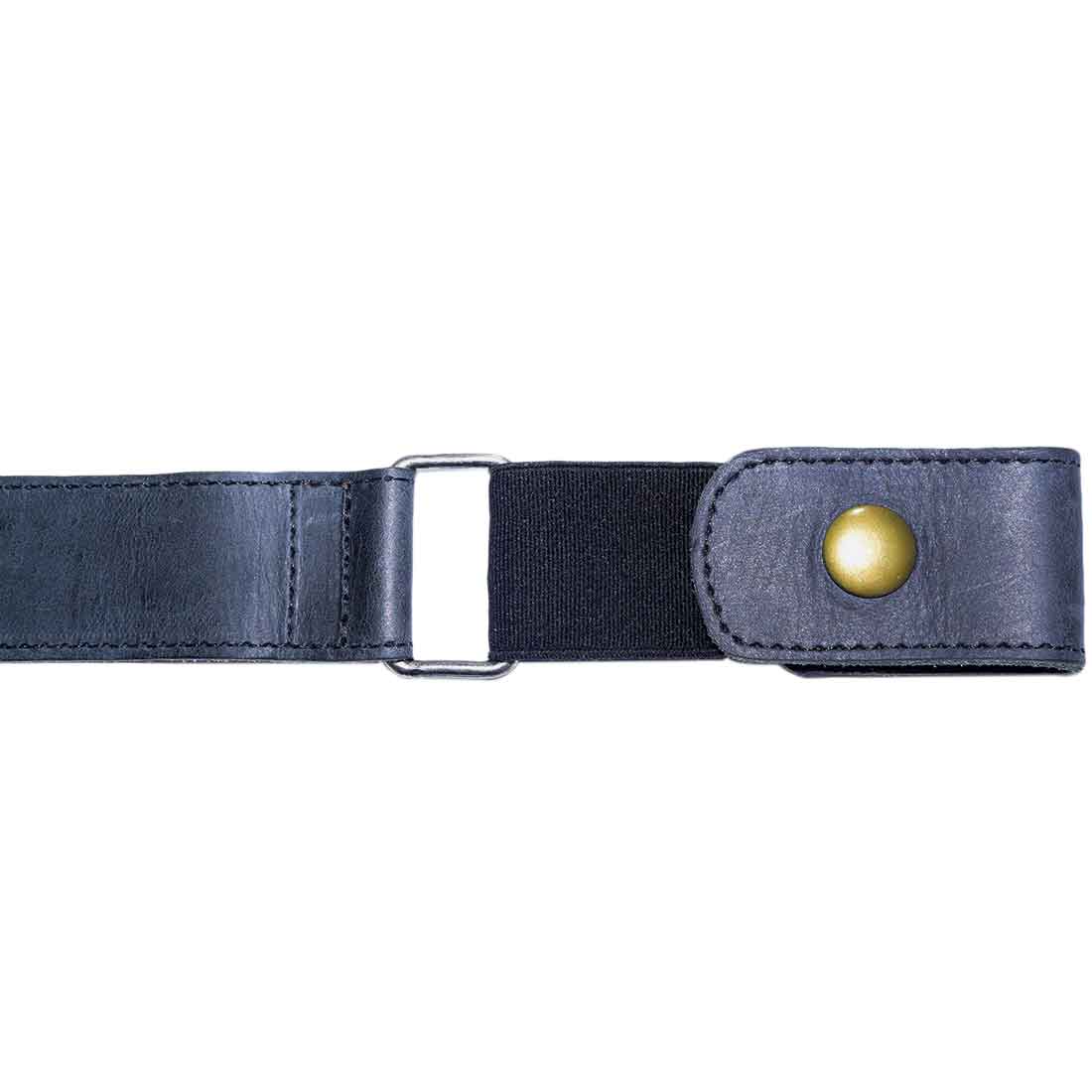 A close-up view of the Hide & Drink No Buckle Belt, showing its sleek brass snap and durable leather finish. This buckle-free leather belt is 1.5 inches wide and offers a comfortable, adjustable fit. Crafted from full grain leather, it embodies the dedication of small batch production, combining artisan craftsmanship from La Antigua Guatemala & Oaxaca Mexico.