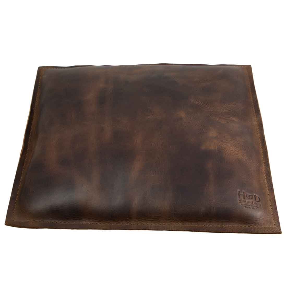 Hide & Drink Decorative Pillow featuring stylish full grain leather, perfect for your couch, sofa, or bed. This 12 x 12 in. pillow adds flair to home and office accessories, embodying small batch production with each piece being hand cut, hand sewn, and fire branded by artisans in La Antigua Guatemala & Oaxaca Mexico.