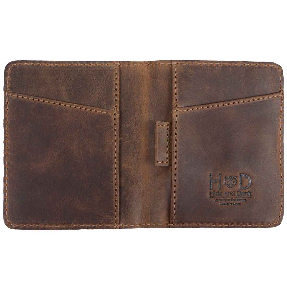 Inside view of the Hide & Drink Minimalist Bi-fold Wallet with card slots and a cash holder. Made from fine full grain leather, this wallet accommodates up to 6 cards plus folded bills, showcasing artisan craftsmanship through hand cutting and hand sewing, embodying everyday accessories for modern living.