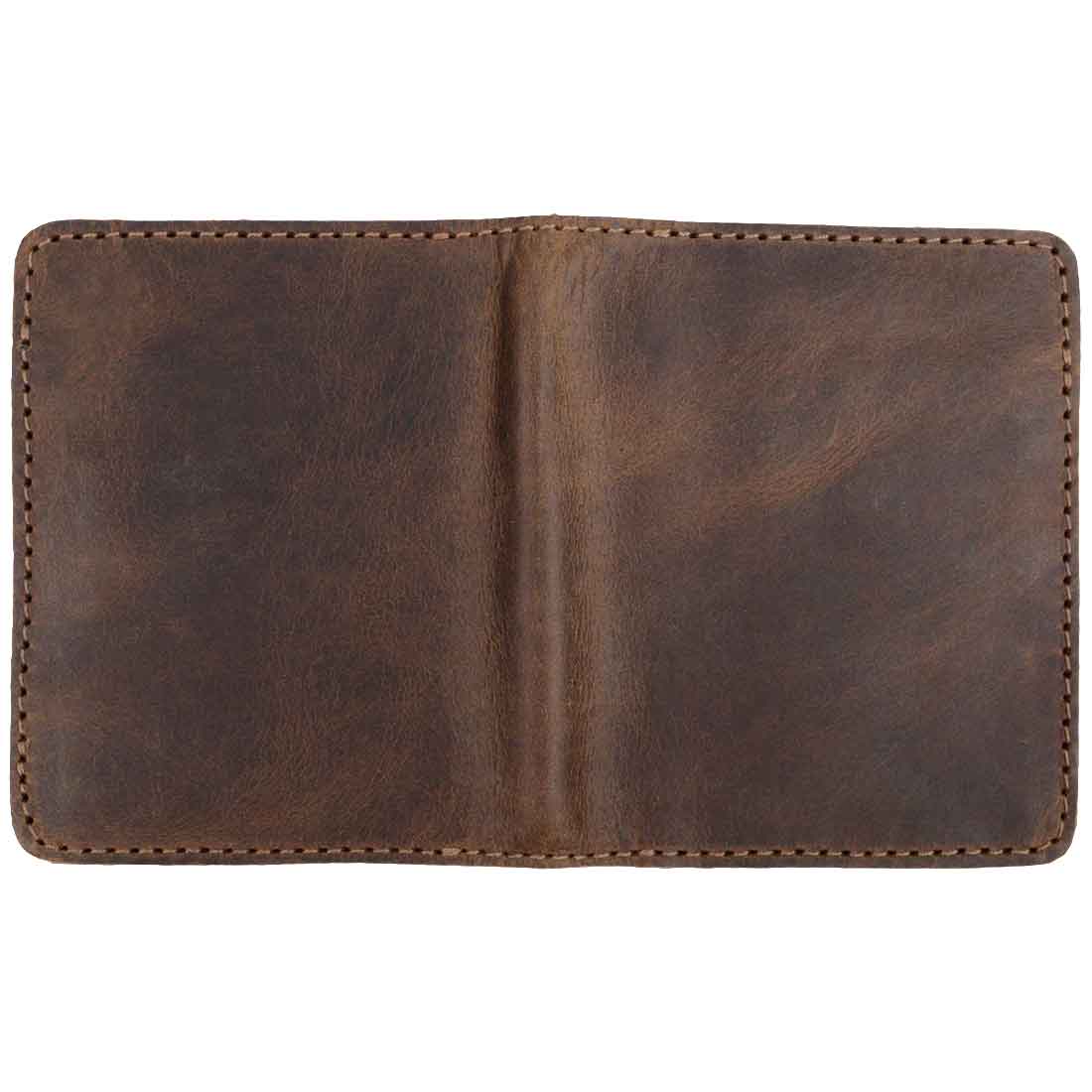 Exterior view of the Hide & Drink Minimalist Bi-fold Wallet emphasizing its rich leather texture. Designed to hold up to 6 cards plus folded bills, this cash organizer is a perfect example of high-quality full grain leather goods, expertly hand cut and sewn by artisans in small batch production.