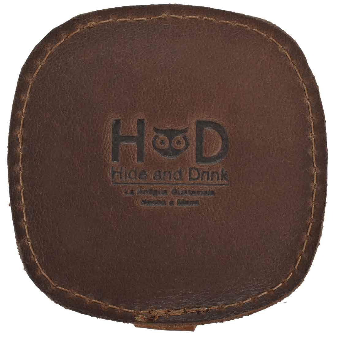 Bottom view of the Wedding Ring Box with the Hide & Drink logo. Crafted from Full Grain Leather, this artisan creation makes an ideal gift for engagements and weddings, emphasizing quality and craftsmanship from La Antigua Guatemala & Oaxaca Mexico.