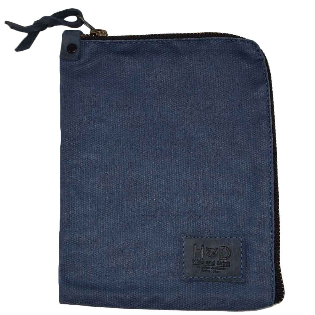 Detailed view of the navy blue Scribbler Case from Hide & Drink, crafted from Waxed Canvas. Ideal for holding notebooks, showcasing small batch production and artisan quality. Handmade in La Antigua Guatemala & Oaxaca Mexico.