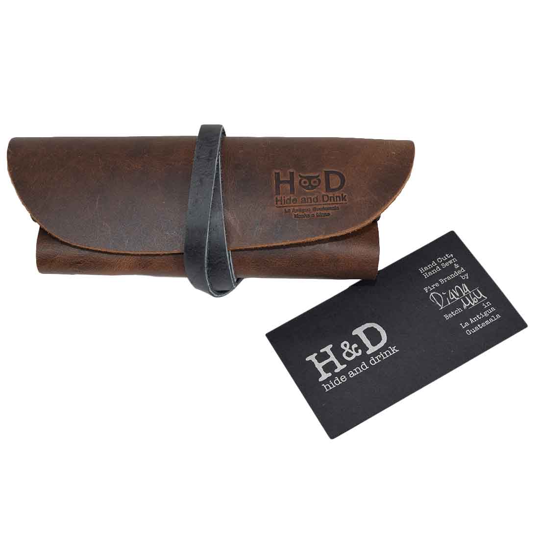 Hide & Drink Leather Sunglass Wrap is the perfect travel accessory to keep your sunglasses safe. This stylish sunglass wrap is crafted with soft full grain leather, providing excellent eye glasses storage. Each piece is artisan crafted, hand cut, and hand sewn in La Antigua Guatemala.