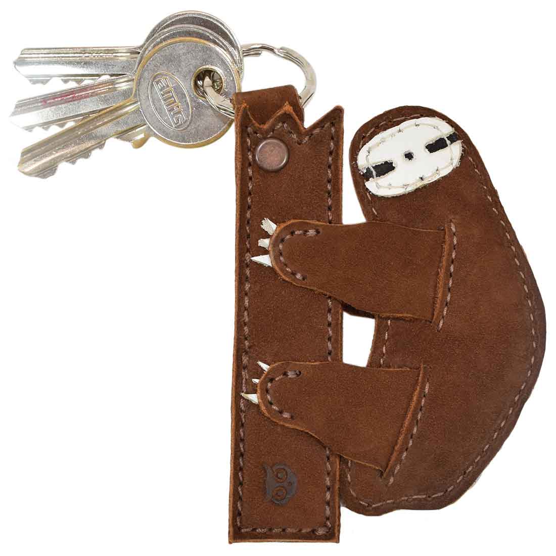Side view of the sloth Critter Key Chain by Hide & Drink, showcasing its cute design and craftsmanship. This charming Animal Key Ring Holder made from Full Grain Leather adds flair to any key collection. Handmade in La Antigua Guatemala & Oaxaca Mexico.