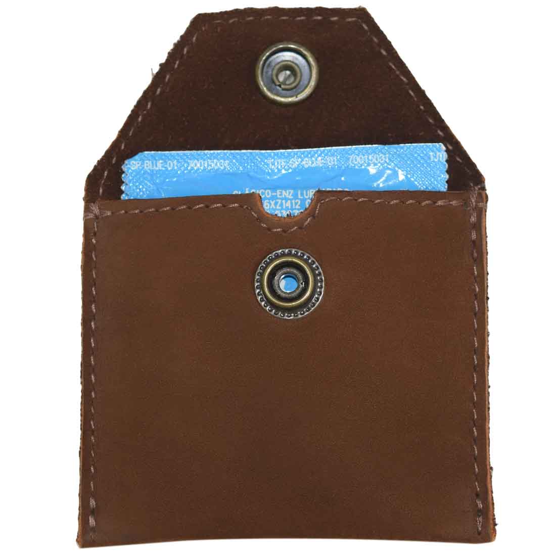Hide & Drink Tampon Case revealing its interior designed for condom storage, showcasing practicality in a stylish leather pouch. Handcrafted in La Antigua Guatemala, emphasizing small batch production.
