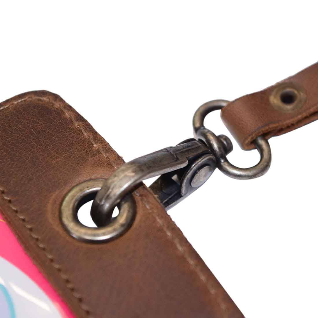 Close-up of Hide & Drink’s Vertical ID Holder showcasing the durable clasp and leather texture, ideal for holding ID badges. This artisan-crafted piece from full grain leather embodies small batch production, featuring hand cut and hand sewn details in La Antigua Guatemala.