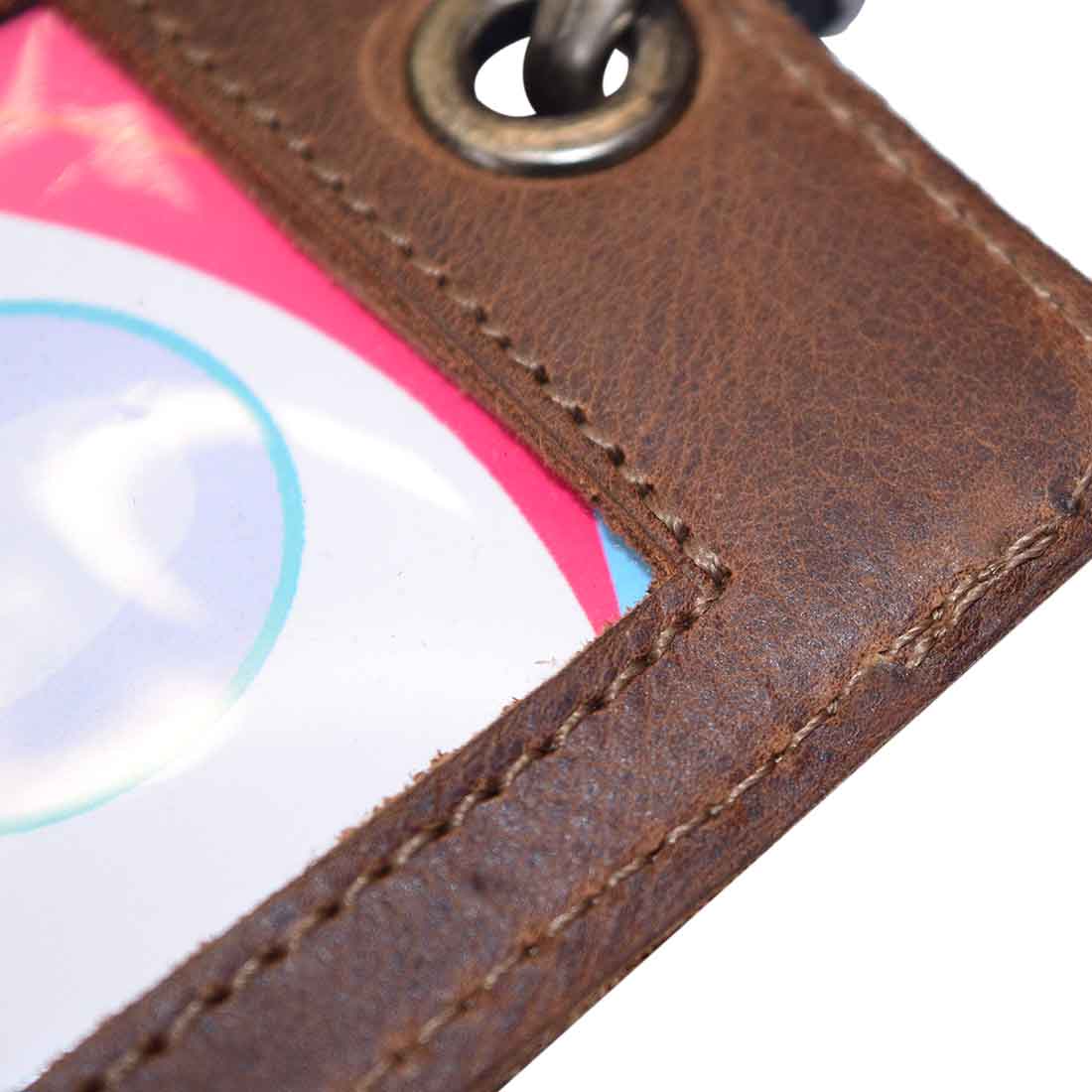 Detailed view of the stitching on Hide & Drink’s Vertical ID Holder, emphasizing quality craftsmanship. This full grain leather accessory is perfect for business and office use, highlighting the handmade artisan process from small batch production.